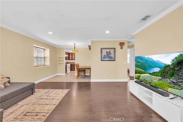 13303 Waco St Unit 62, Baldwin Park, CA 91706 - living room featuring crown molding, recessed lighting, and wood finished floors