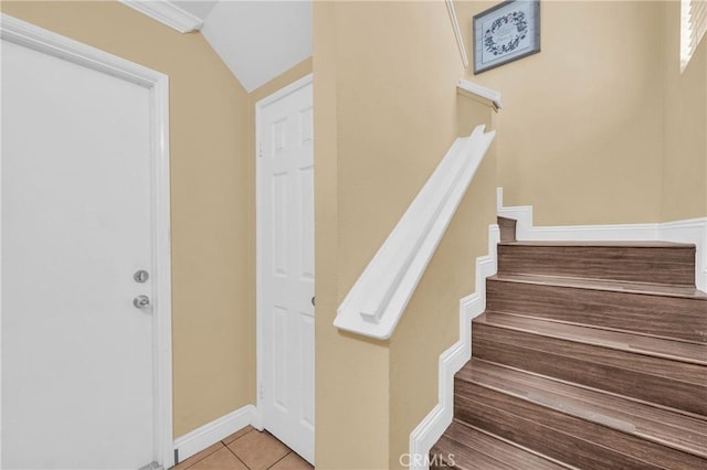 13303 Waco St Unit 62, Baldwin Park, CA 91706 - stairs with tile patterned floors and vaulted ceiling