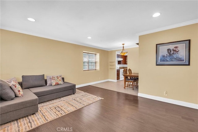 13303 Waco St Unit 62, Baldwin Park, CA 91706 - living area featuring crown molding, wood finished floors, and recessed lighting