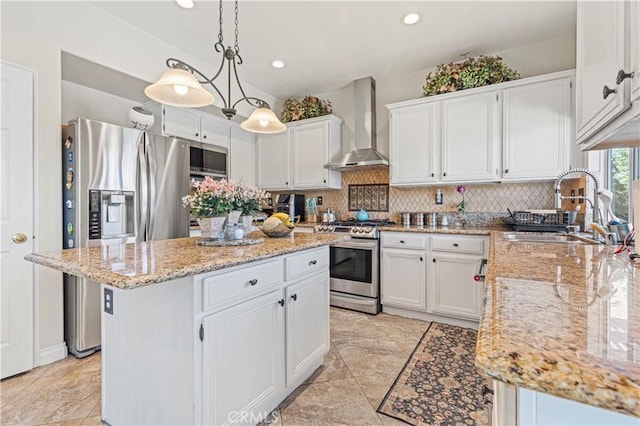 1555 Lupine Cir, Corona, CA 92881 - kitchen with wall chimney range hood, stainless steel appliances, a kitchen island, backsplash, and white cabinetry