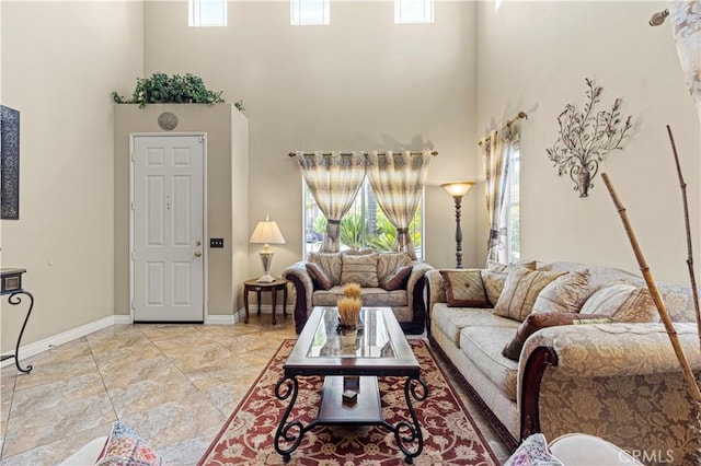 1555 Lupine Cir, Corona, CA 92881 - living area featuring a towering ceiling and plenty of natural light