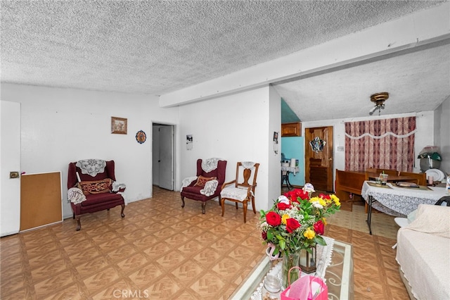 526 Nottingham Ave, Santa Ana, CA 92703 - living area with a textured ceiling and light floors