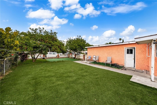 526 Nottingham Ave, Santa Ana, CA 92703 - fenced backyard featuring a patio