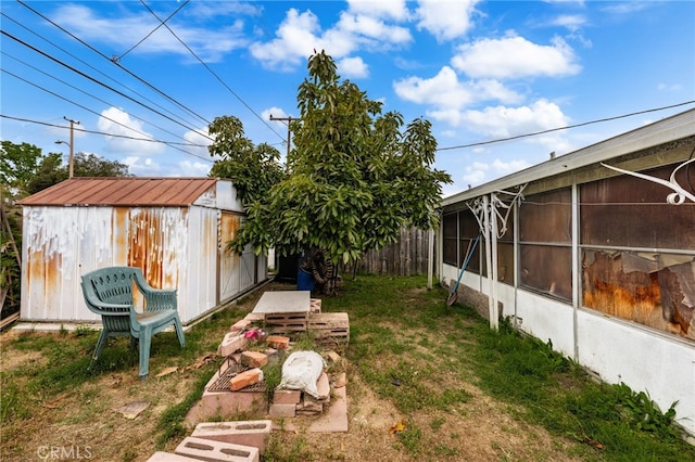 526 Nottingham Ave, Santa Ana, CA 92703 - view of yard with a storage shed and a sunroom