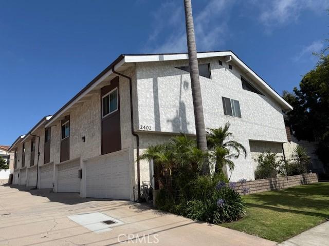 2402 Aviation Blvd Unit C, Redondo Beach, CA 90278 - view of property exterior featuring stucco siding