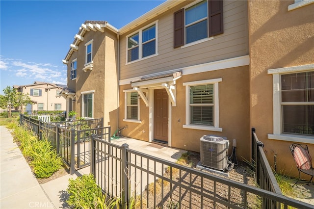 16502 Casa Grande Ave Unit 102, Fontana, CA 92336 - view of front of home featuring stucco siding and a residential view
