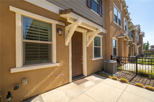 16502 Casa Grande Ave Unit 102, Fontana, CA 92336 - doorway to property with stucco siding