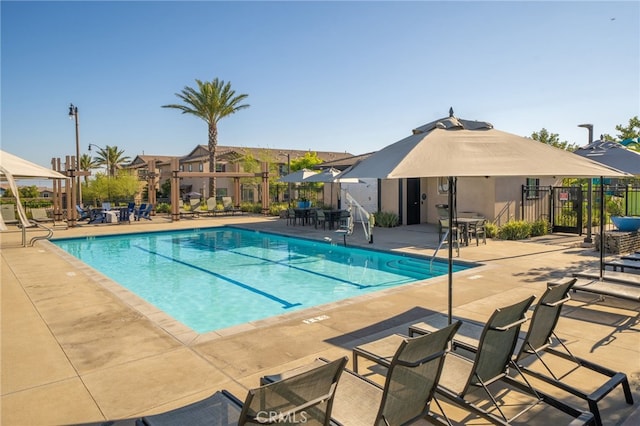 16502 Casa Grande Ave Unit 102, Fontana, CA 92336 - community pool featuring a patio area