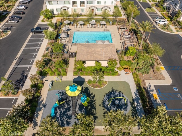 16502 Casa Grande Ave Unit 102, Fontana, CA 92336 - drone / aerial view of a pool