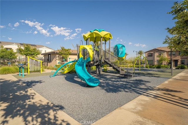 16502 Casa Grande Ave Unit 102, Fontana, CA 92336 - community jungle gym featuring a residential view