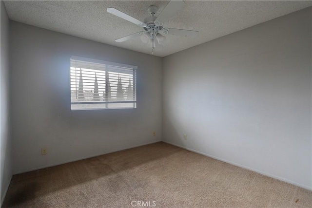 6186 Hefley St Unit 13, Westminster, CA 92683 - carpeted spare room with a textured ceiling and ceiling fan