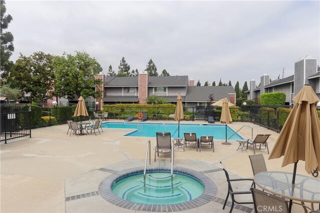 6186 Hefley St Unit 13, Westminster, CA 92683 - community pool featuring a patio and a community hot tub