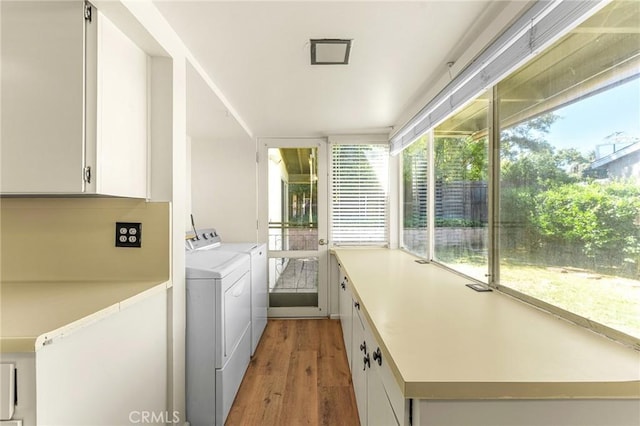1204 San Jacinto, Redlands, CA 92373 - laundry room featuring cabinet space, independent washer and dryer, and light wood-type flooring