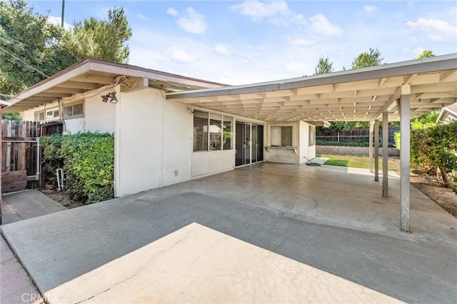1204 San Jacinto, Redlands, CA 92373 - view of patio / terrace featuring a carport and concrete driveway