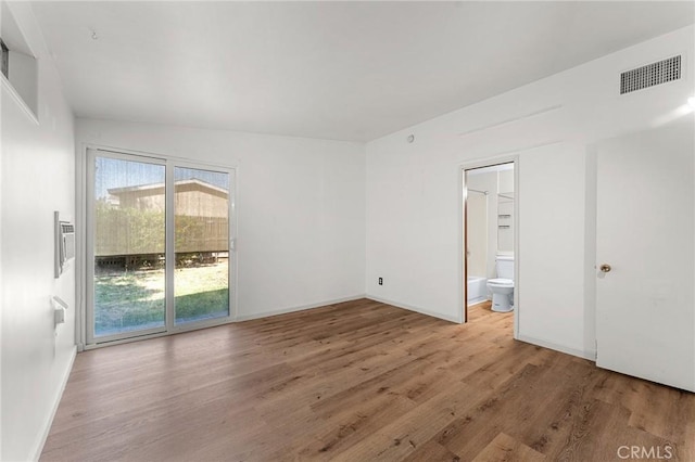 1204 San Jacinto, Redlands, CA 92373 - empty room with wood finished floors and baseboards