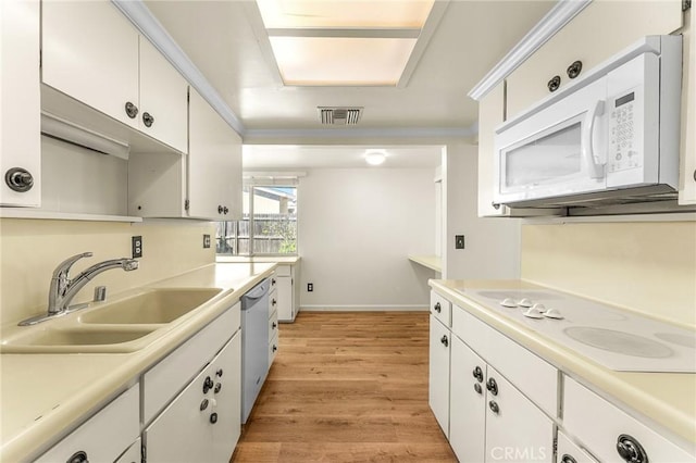 1204 San Jacinto, Redlands, CA 92373 - kitchen with white appliances, light wood-style flooring, light countertops, and white cabinets