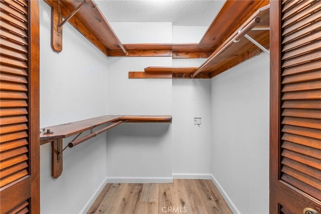 1204 San Jacinto, Redlands, CA 92373 - spacious closet featuring wood finished floors