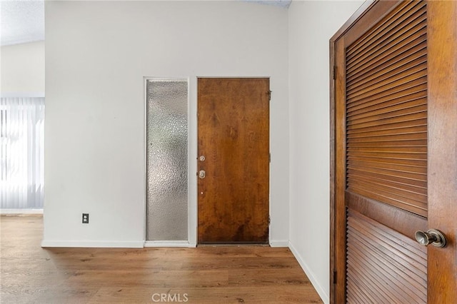 1204 San Jacinto, Redlands, CA 92373 - entrance foyer with wood finished floors and baseboards