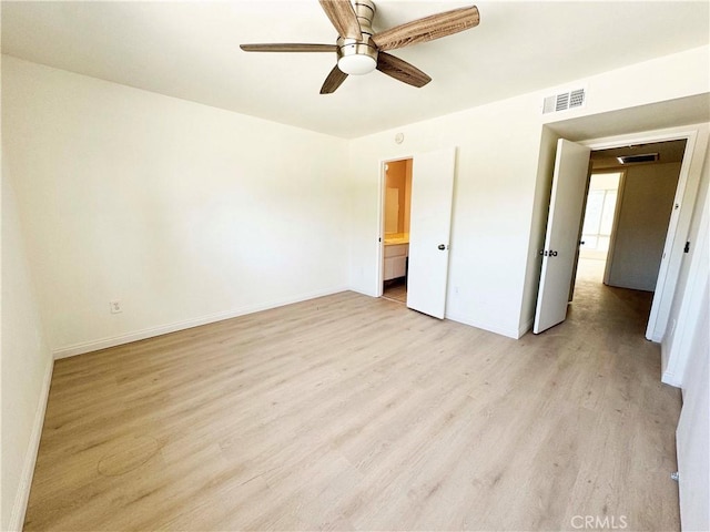 25180 5th St Unit 213, San Bernardino, CA 92410 - unfurnished bedroom featuring light wood-style flooring, ceiling fan, and ensuite bath