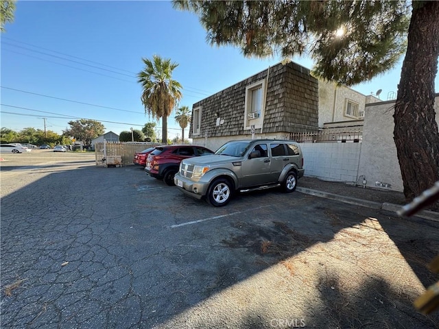 25180 5th St Unit 213, San Bernardino, CA 92410 - view of uncovered parking lot
