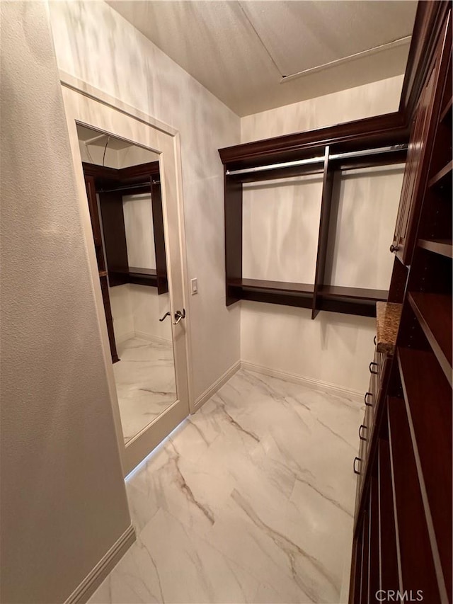 44 Arcata, Irvine, CA 92602 - walk in closet with marble look tiles