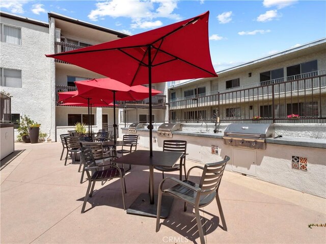 5334 Lindley Ave Unit 125, Encino, CA 91316 - view of patio with area for grilling and outdoor dining area