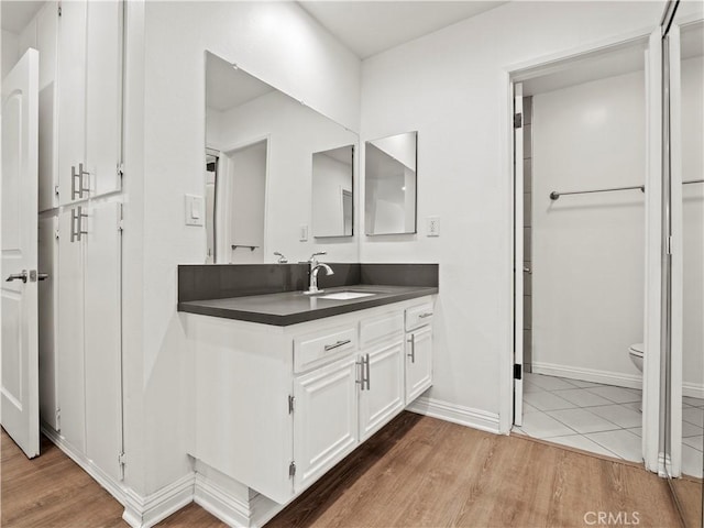 5334 Lindley Ave Unit 125, Encino, CA 91316 - bathroom featuring vanity and wood finished floors