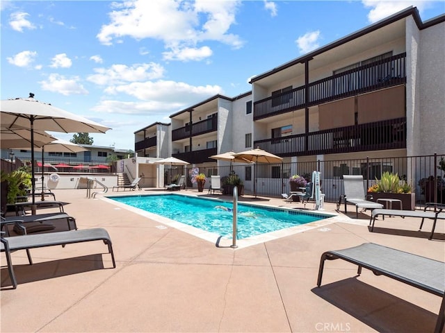 5334 Lindley Ave Unit 125, Encino, CA 91316 - community pool featuring a patio and a residential view