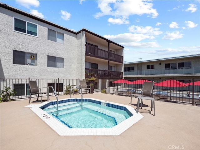 5334 Lindley Ave Unit 125, Encino, CA 91316 - view of swimming pool featuring a community hot tub