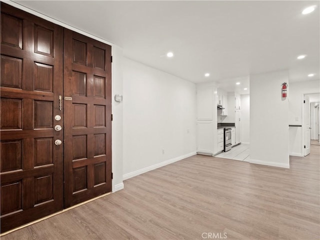 5334 Lindley Ave Unit 125, Encino, CA 91316 - entryway with light wood-type flooring and recessed lighting