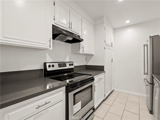 5334 Lindley Ave Unit 125, Encino, CA 91316 - kitchen featuring stainless steel appliances, under cabinet range hood, dark countertops, white cabinets, and recessed lighting