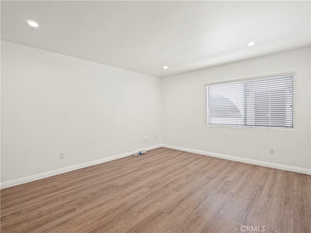5334 Lindley Ave Unit 125, Encino, CA 91316 - unfurnished room featuring light wood-style flooring and recessed lighting