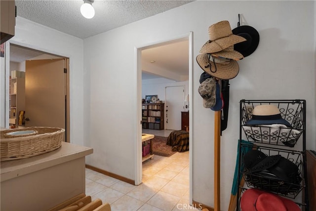 5266 Bluff St, Norco, CA 92860 - hall featuring light tile patterned floors and a textured ceiling