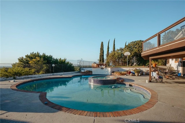 5266 Bluff St, Norco, CA 92860 - view of swimming pool featuring a patio and a pool with connected hot tub