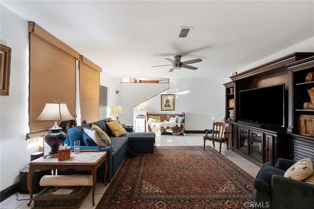 5266 Bluff St, Norco, CA 92860 - living room featuring light tile patterned floors and a ceiling fan