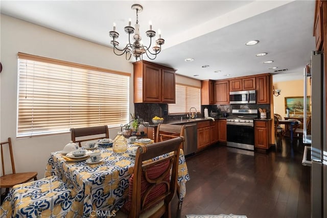 5266 Bluff St, Norco, CA 92860 - dining space featuring dark wood-style flooring, a chandelier, and recessed lighting