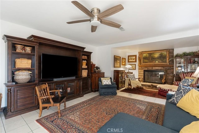 5266 Bluff St, Norco, CA 92860 - tiled living area featuring a large fireplace and ceiling fan