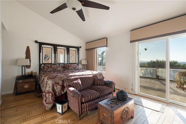 5266 Bluff St, Norco, CA 92860 - bedroom featuring access to outside, multiple windows, vaulted ceiling, wood finished floors, and ceiling fan