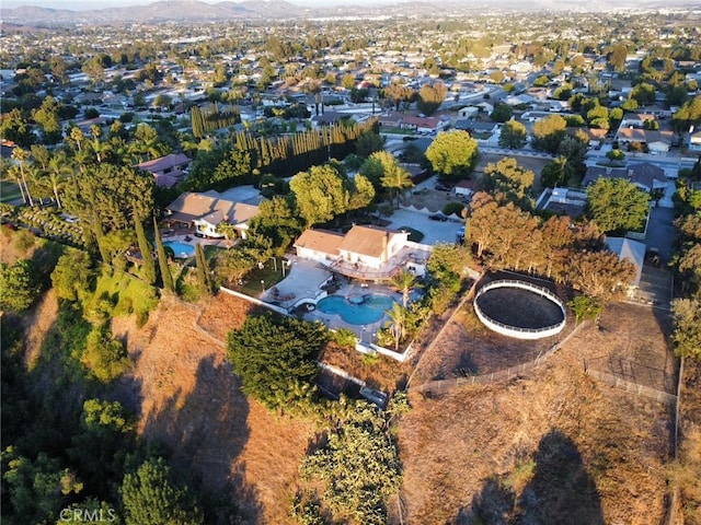 5266 Bluff St, Norco, CA 92860 - aerial view of residential area featuring a mountainous background and a pool