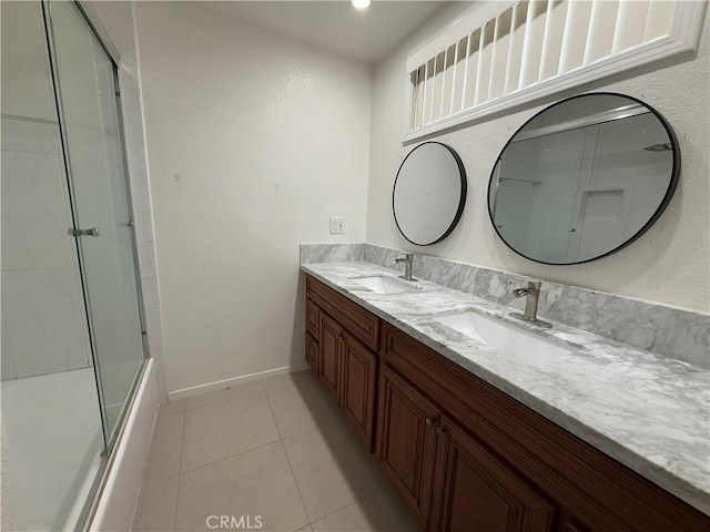 11057 Dudley Way, Stanton, CA 90680 - full bathroom featuring double vanity and enclosed tub / shower combo
