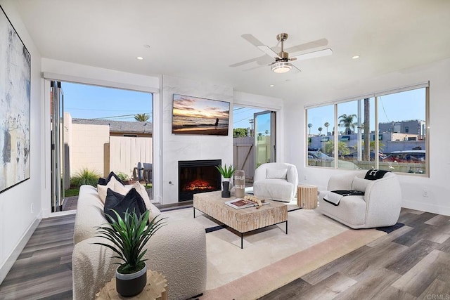 1506 Alvarado St, Oceanside, CA 92054 - living room featuring a large fireplace, plenty of natural light, wood finished floors, and recessed lighting