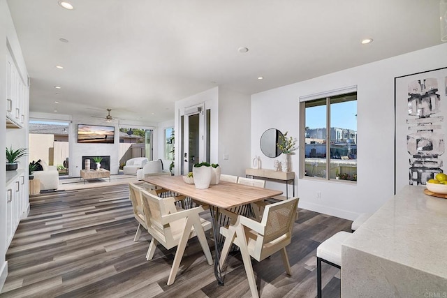 1506 Alvarado St, Oceanside, CA 92054 - dining room featuring dark wood-style floors, a large fireplace, a ceiling fan, and recessed lighting