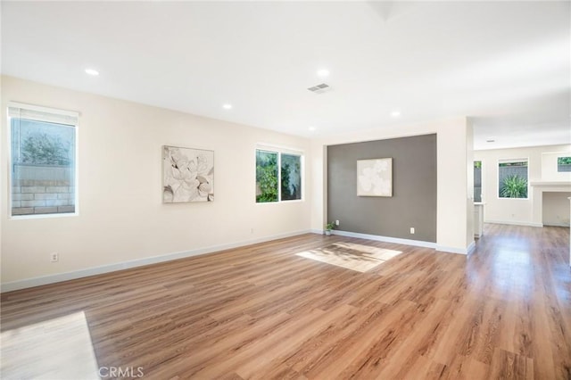 149 E Saint Andrews St, Ontario, CA 91761 - unfurnished room featuring plenty of natural light, light wood-style floors, and recessed lighting
