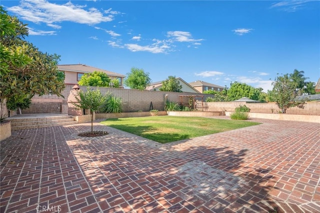 149 E Saint Andrews St, Ontario, CA 91761 - fenced backyard with a patio area