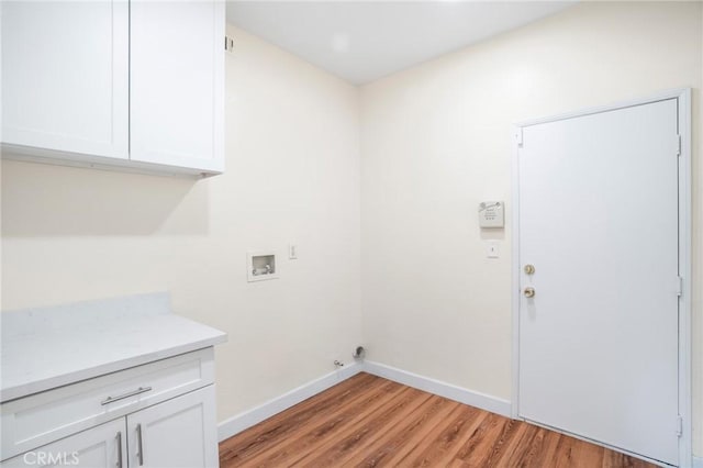 149 E Saint Andrews St, Ontario, CA 91761 - laundry area featuring cabinet space, washer hookup, and light wood finished floors