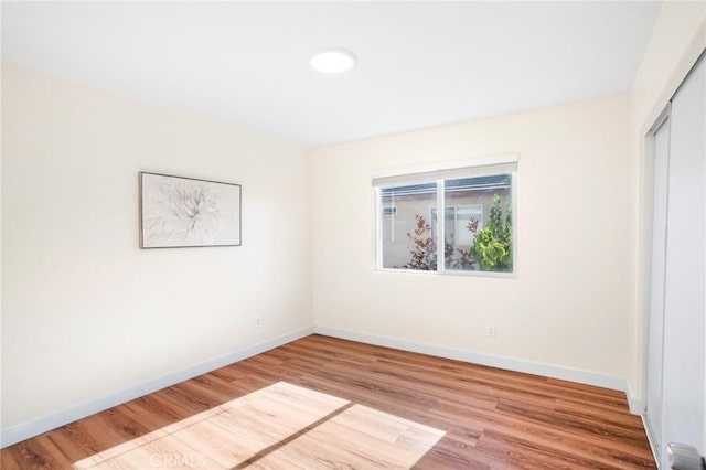 149 E Saint Andrews St, Ontario, CA 91761 - unfurnished bedroom with wood finished floors and a closet
