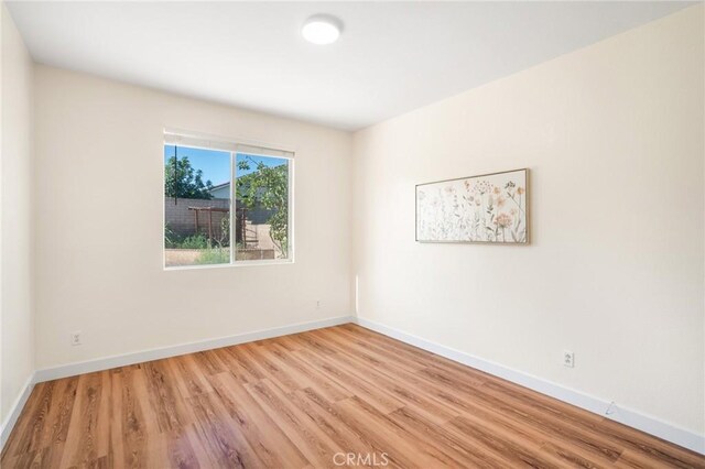 149 E Saint Andrews St, Ontario, CA 91761 - spare room featuring wood finished floors and baseboards