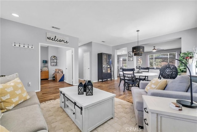 31164 Twilight Vista Dr, Menifee, CA 92584 - living area featuring light wood-type flooring, recessed lighting, and ceiling fan