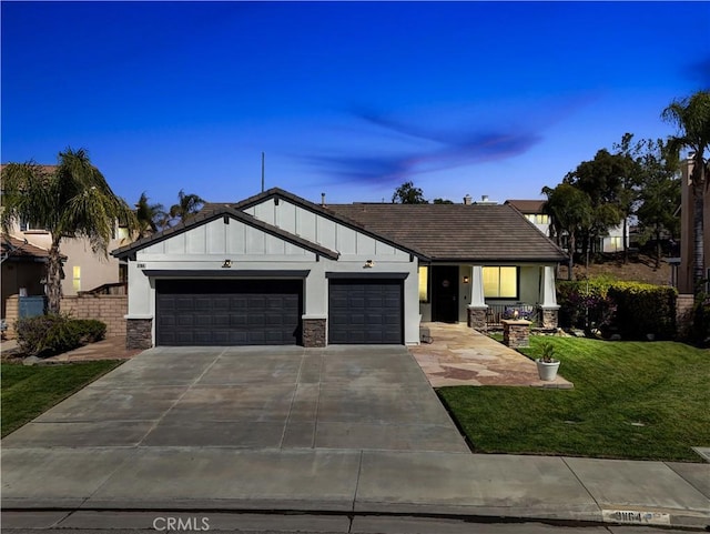 31164 Twilight Vista Dr, Menifee, CA 92584 - view of front of property with an attached garage, driveway, board and batten siding, a front yard, and covered porch