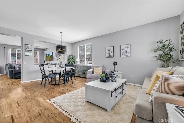 31164 Twilight Vista Dr, Menifee, CA 92584 - living area featuring light wood-type flooring and baseboards